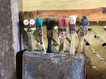 Paint brushes are wide-eyed and all stuck-up.